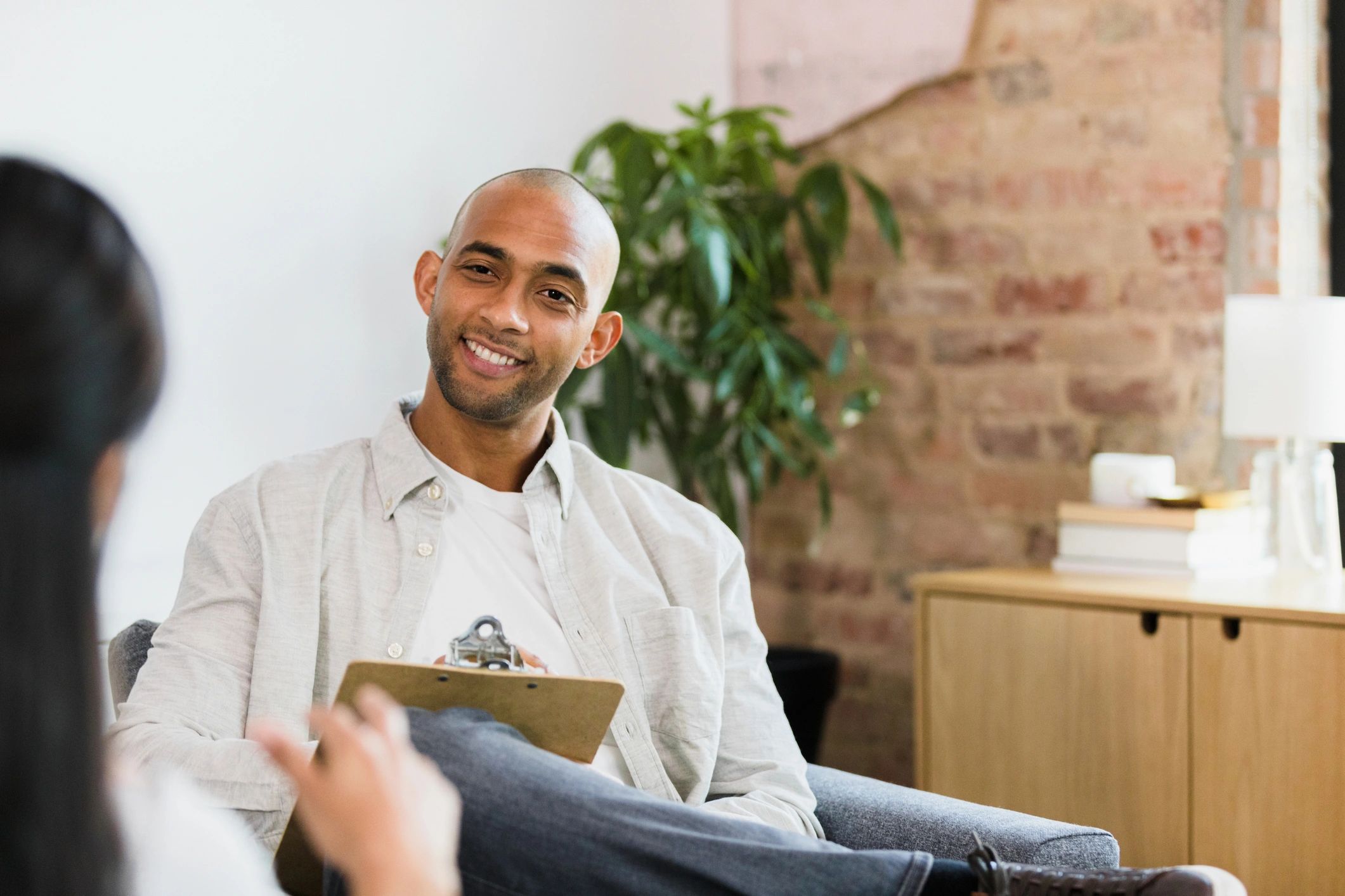 Therapist listening attentively during a counseling session